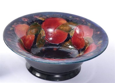 Lot 52 - A William Moorcroft Pomegranate pedestal bowl