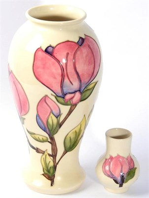 Lot 54 - A Moorcroft Magnolia vase and another (2)