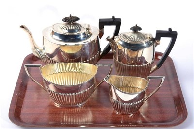 Lot 59 - A silver three piece tea service, Walker & Hall, Sheffield 1900/01, and a matched hot water...