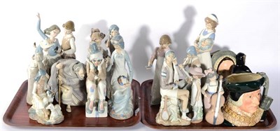 Lot 63 - Fifteen Lladro and similar figures; two Royal Doulton Toby jugs; and another (two trays)