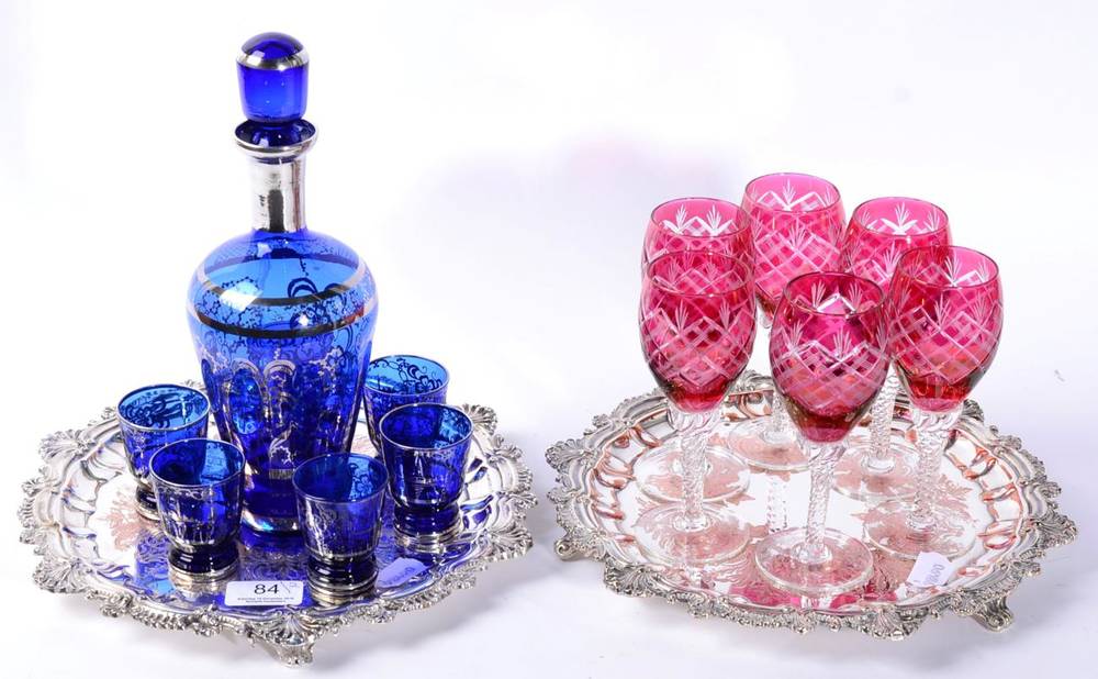 Lot 84 - Two plated trays and coloured glassware