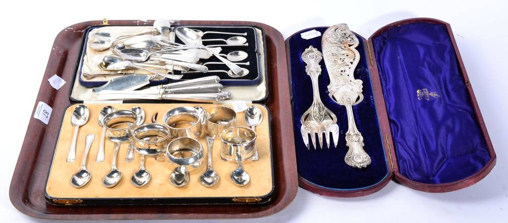 Lot 87 - Silver comprising cased teaspoons; various napkin rings etc; together with a cased pair of...