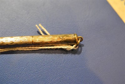 Lot 103 - A 9 carat gold toothpick, 6.2g