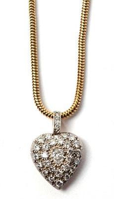 Lot 104 - An antique-style diamond heart pendant, pavé set with a pear cut diamond and round brilliant...