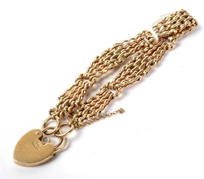 Lot 121 - A 9 carat gold gate link bracelet with padlock clasp, 18.8g