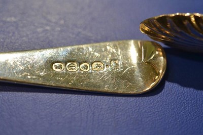 Lot 132 - A provincial or colonial silver table fork, untraced marks; a pair of Scottish fiddle pattern sugar