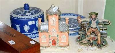 Lot 155 - A cheese dome with an associated base, a 19th century Staffordshire cottage (a.f.) and a...