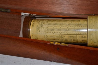 Lot 156 - A wooden cased calculating slide rule, and magic lantern glass slides