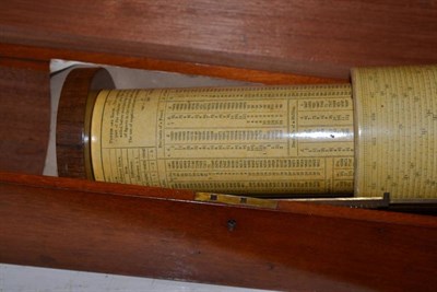 Lot 156 - A wooden cased calculating slide rule, and magic lantern glass slides