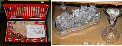 Lot 159 - A silver mounted cut glass ship's decanter; another cut glass ship's decanter; a silver plated...