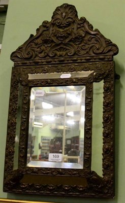 Lot 169 - A 19th century patinated metal sectional mirror