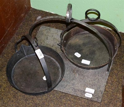 Lot 176 - Three 19th century hanging open-fire cooking platforms