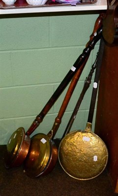 Lot 178 - Three 18th/19th century copper and brass bedwarming pans and a set of fire tongs