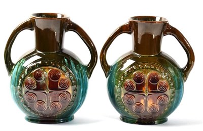 Lot 213 - Two Linthorpe pottery twin handled vases, designed by Christopher Dresser, shape no. 337