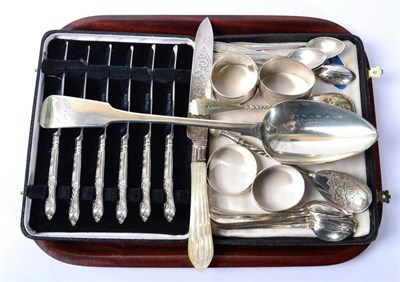 Lot 231 - A quantity of assorted silver including a basting spoon; teaspoon; napkin rings etc
