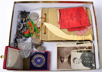 Lot 234 - Assorted Second World War and Police medals; related photographs and souvenirs pertaining to...