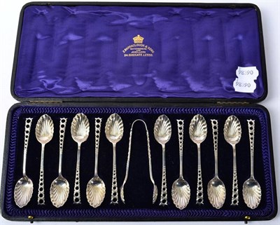 Lot 236 - A set of twelve Edwardian silver teaspoons and tongs, Atkin Bros, Sheffield 1905, with...