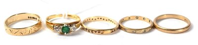 Lot 249 - A 9 carat gold emerald ring; and four 9 carat gold rings, 11.2g gross (5)