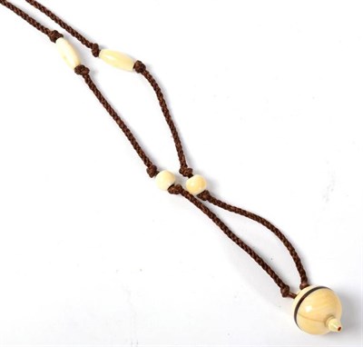 Lot 277 - A Victorian turned ivory and tortoiseshell vinaigrette on a hairwork and ivory necklace, the...