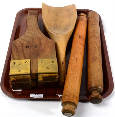 Lot 316 - A tray of 19th century treen kitchenalia including grain scoop