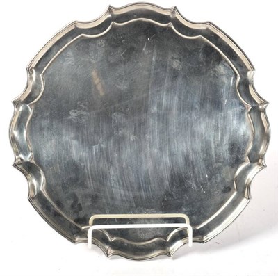 Lot 325 - A shaped circular silver salver, James Dixon & Son, Sheffield 1933, 25.5cm diameter, 19.9ozt