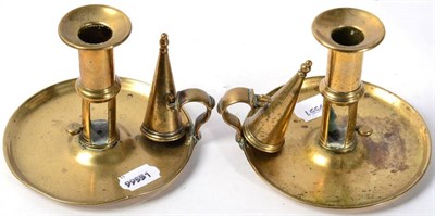 Lot 328 - A pair of 19th century brass push up chambersticks and snuffers