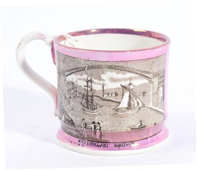 Lot 331 - A Sunderland lustre mug decorated with Sunderland Bridge and a verse