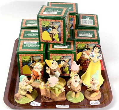 Lot 336 - Royal Doulton Snow White and the Seven Dwarfs including an additional Dopey, each boxed (9)