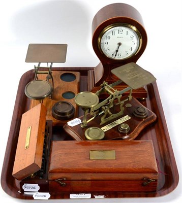 Lot 337 - Two sets of postal scales; a cased set of weights; a hydrometer; and an Edwardian mantel clock