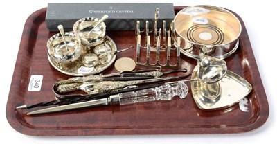 Lot 340 - Silver items, to include: a coaster; toast racks; 18th century coin set toddy ladle; button...