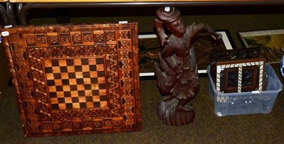 Lot 361 - A large carved wooden South East Asian figure of a dancer; a marquetry inlaid game's table top,...