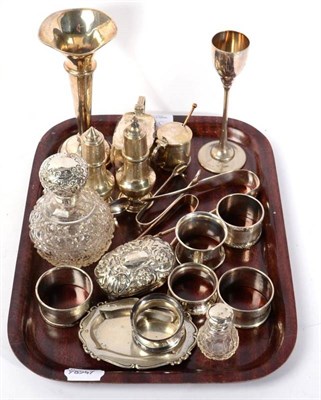 Lot 387 - A group of silver items to include napkin rings; sugar tongs; a Victorian drum shaped mustard...