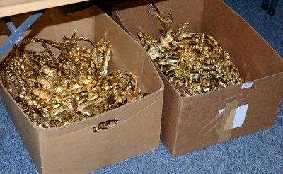 Lot 1140 - Two boxes of gilt metal curtain tie backs