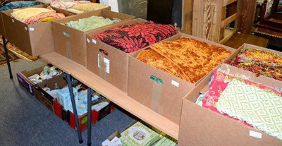 Lot 1164 - Assorted textiles in nine boxes, including bed covers, velvet, brocade and cotton curtains,...
