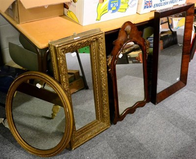Lot 1192 - A Georgian style walnut fret carved wall mirror; a 19th century rosewood framed mirror; and two...