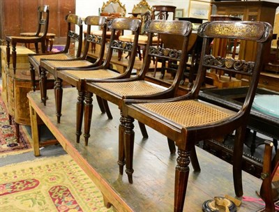 Lot 1195 - A set of six Regency simulated chairs