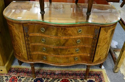 Lot 1197 - A serpentine fronted mahogany sideboard of George III style