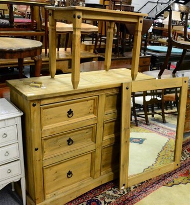 Lot 1198 - A pine chest of drawers; together with a matching coffee table and mirror