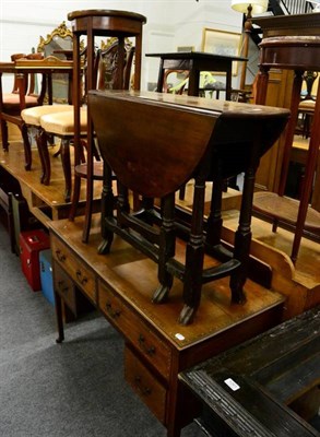 Lot 1203 - A 19th century mahogany gateleg occasional table and two other occasional tables (3)