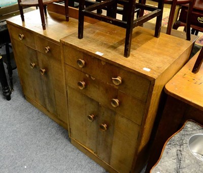 Lot 1208 - A teak unit fitted with drawers and cupboards