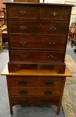 Lot 1210 - An Arts & Crafts oak dressing chest (mirror lacking); together with an oak four height chest of...