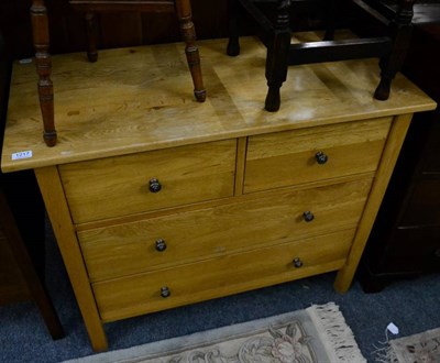 Lot 1217 - A modern light oak three height chest of drawers