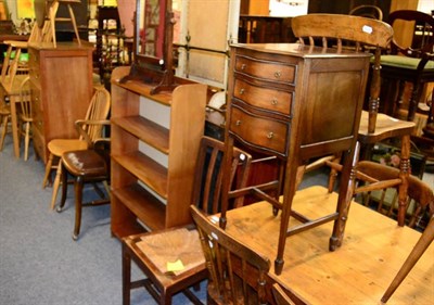 Lot 1226 - A small teak coffee table, a mid 20th century oak five height chest of drawers, a 1920's oak...