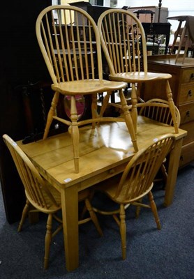 Lot 1227 - A pine kitchen table, together with six Windsor style chairs and an oak hall mirror