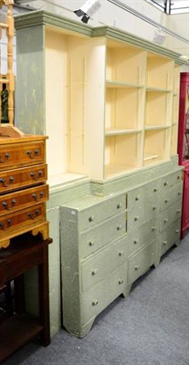 Lot 1231 - A painted breakfront bookcase cabinet