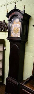 Lot 1272 - An ebonised eight day longcase clock, arched brass dial with later signature Edward Upjohn of Exon