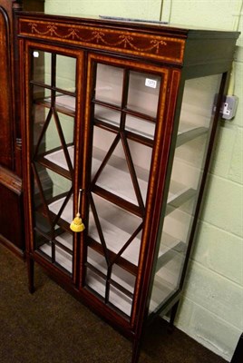 Lot 1273 - An Edwardian inlaid display cabinet