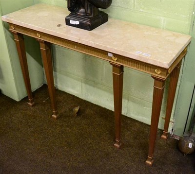 Lot 1280 - A reproduction marble top console table with gilt fluted stand