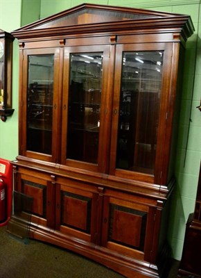 Lot 1288 - Modern mahogany and ebony crossbanded three door glazed bookcase