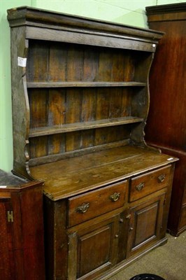 Lot 1291 - An oak dresser and rack of small proportions